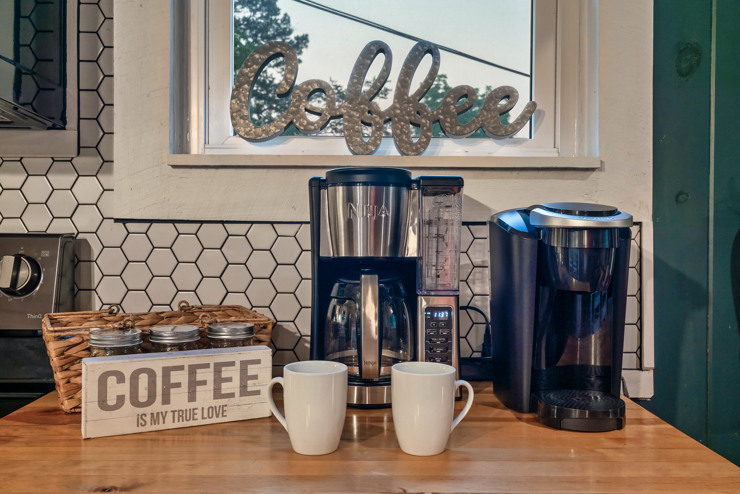 Hillside Haven coffee station with dual brewers in Tennessee cabin kitchen