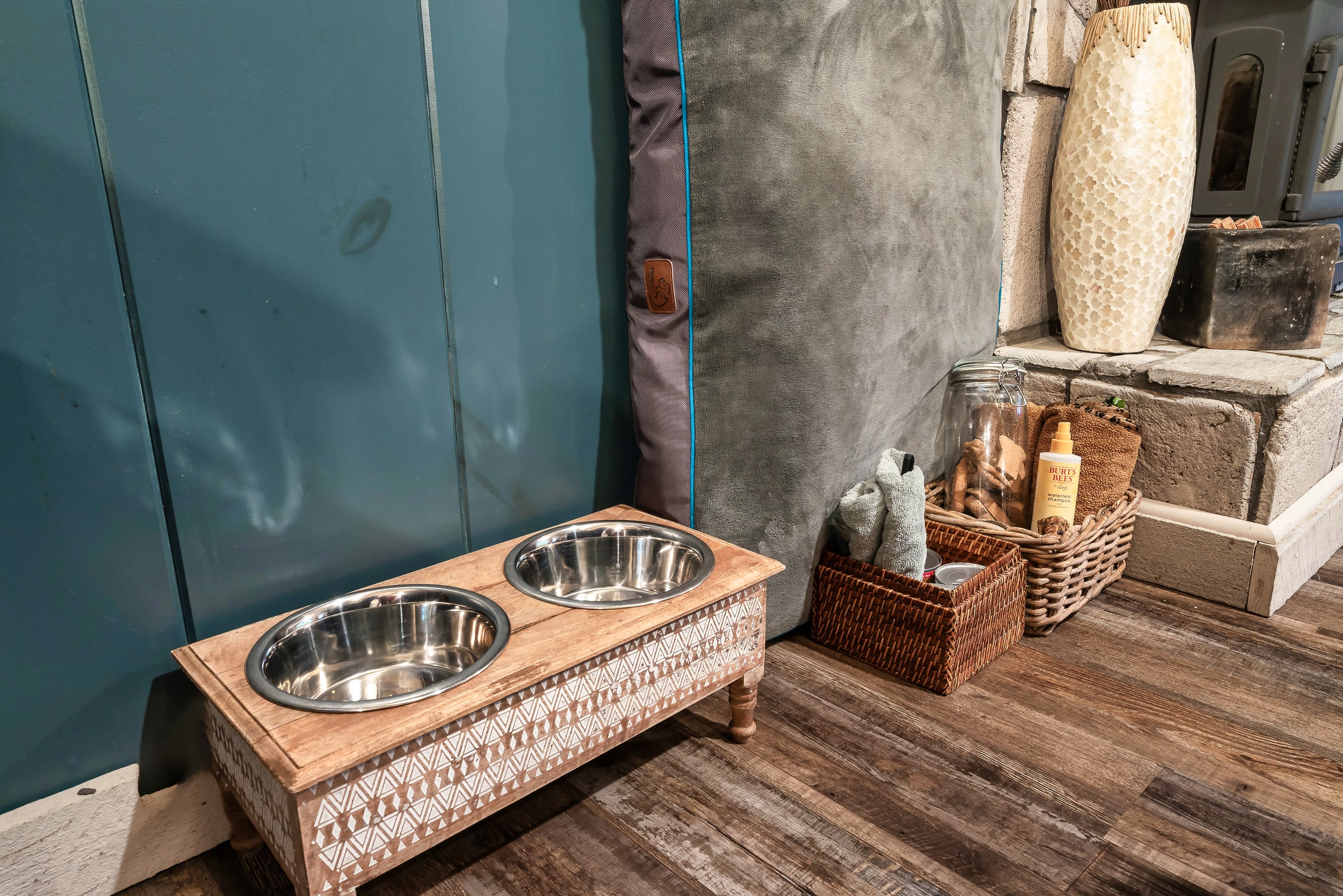 Hillside Haven pet feeding station with elevated bowls in Tennessee cabin