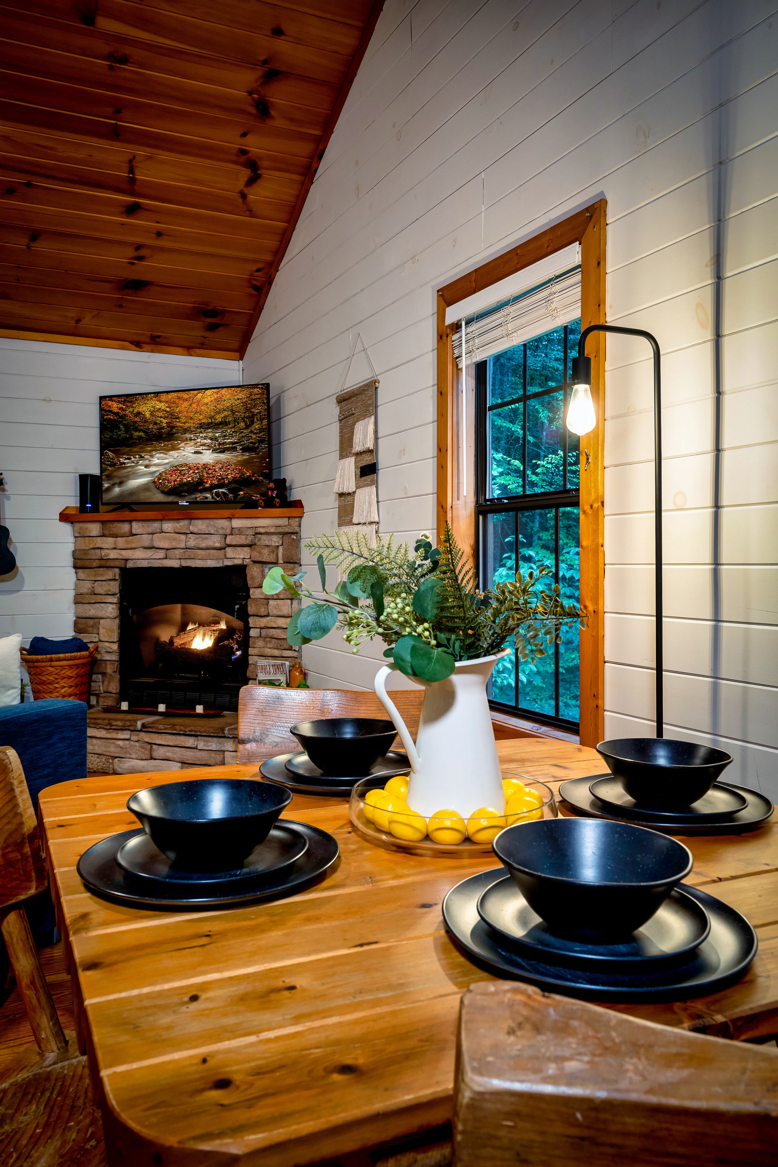 Dining table with fireplace view at Smoky Creek Hideaway Tennessee