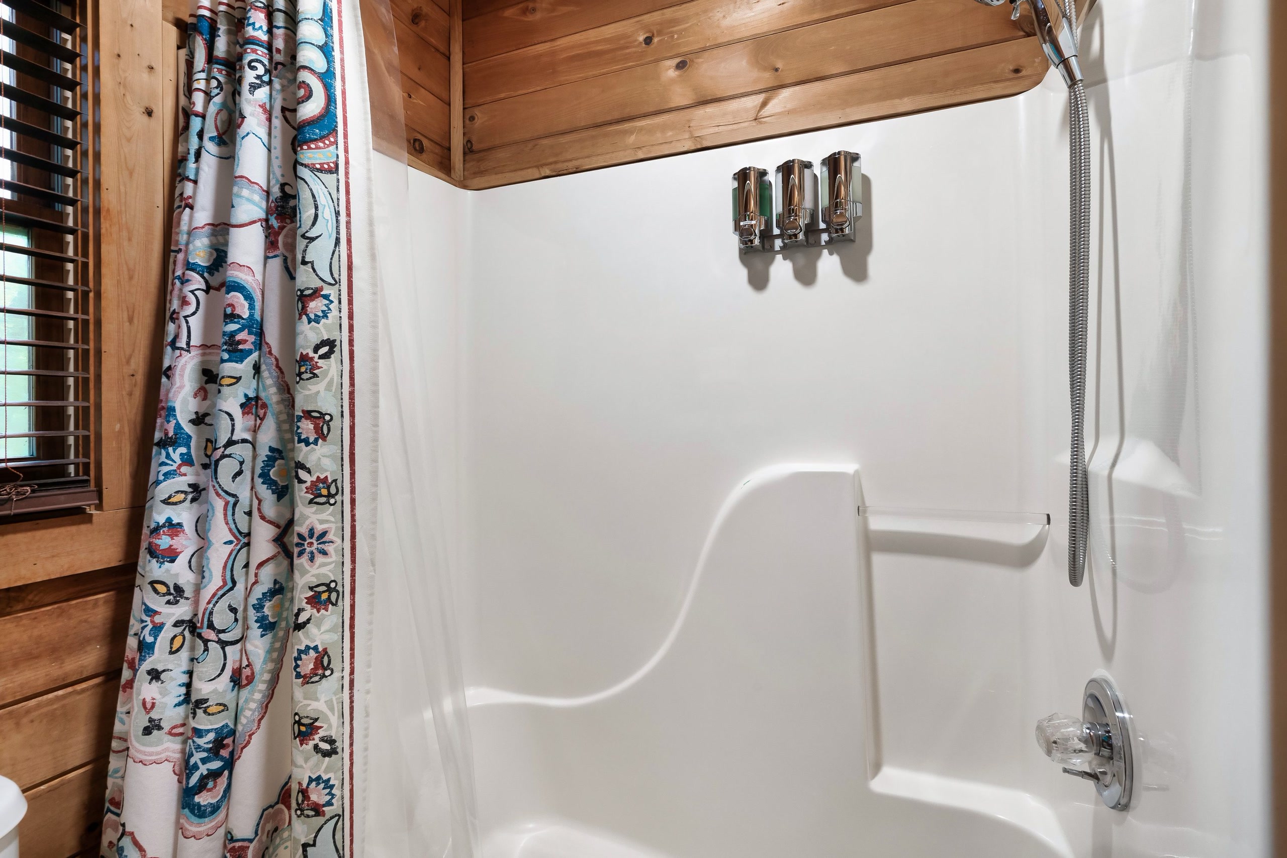 Tub-shower combination at Rustic Rooster Tennessee cabin bathroom