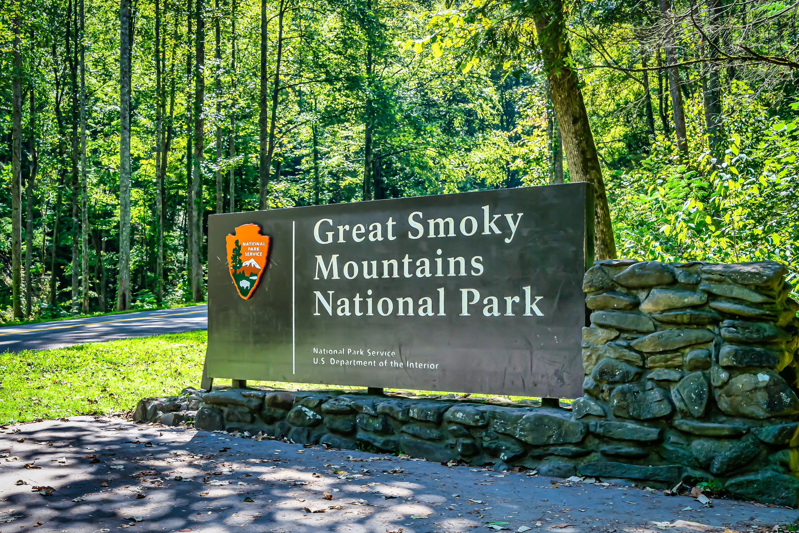 Great Smoky Mountains National Park entrance sign near Rustic Rooster cabin