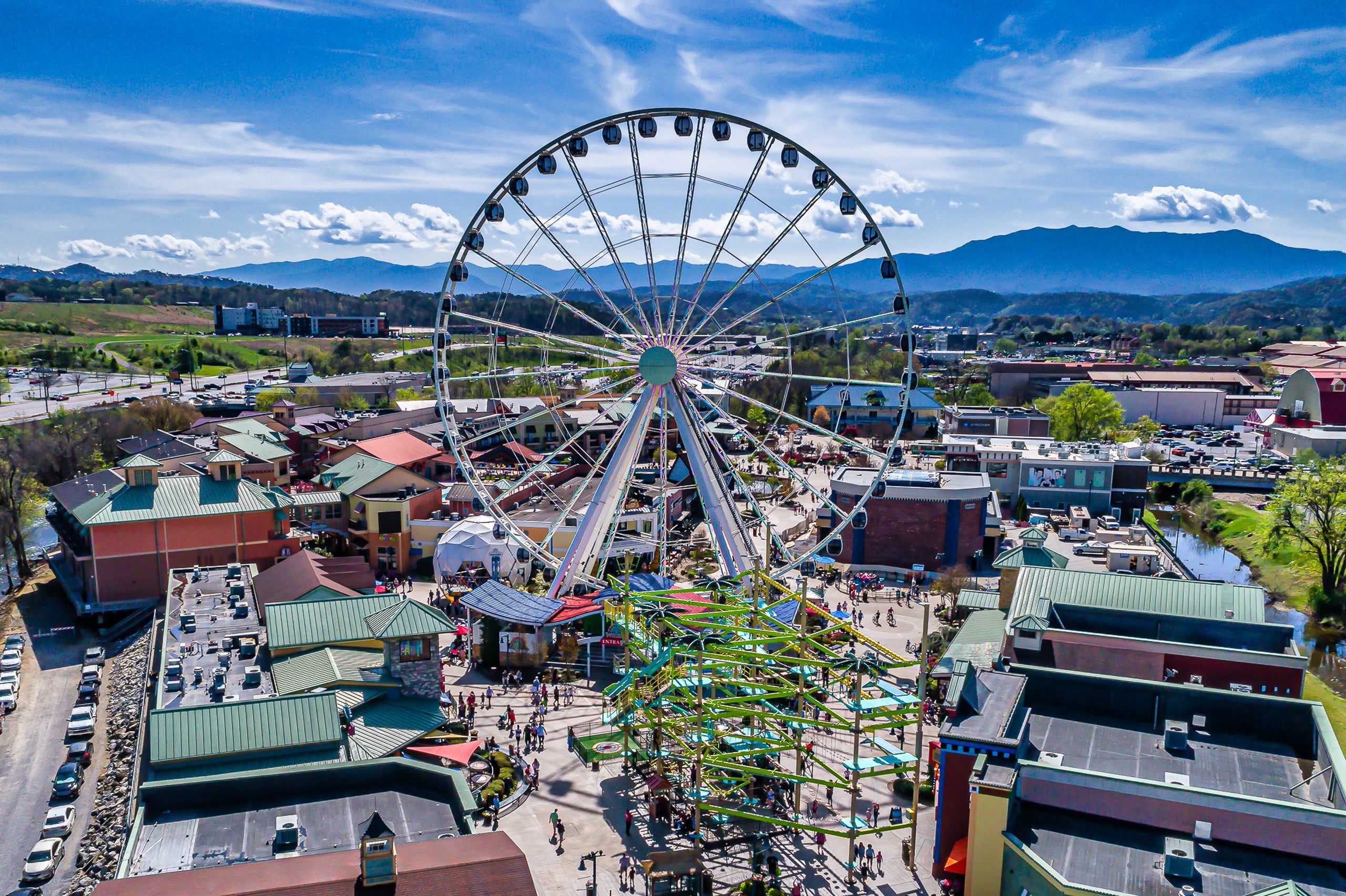 Pigeon Forge entertainment district with Ferris wheel near Rustic Rooster TN